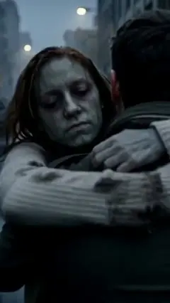 Frame at 10 s: the zombie hugs him instead of biting